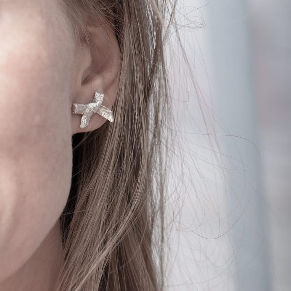 Handmade earrings, silver in detail