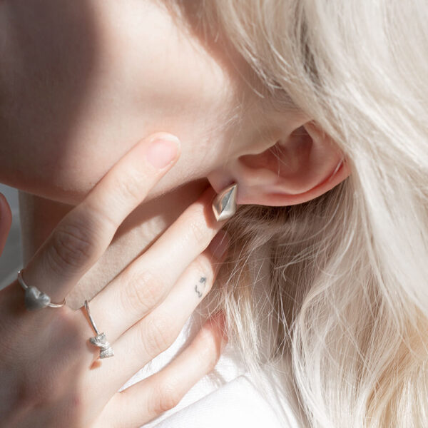 Elegant and chic earrings half of a heart